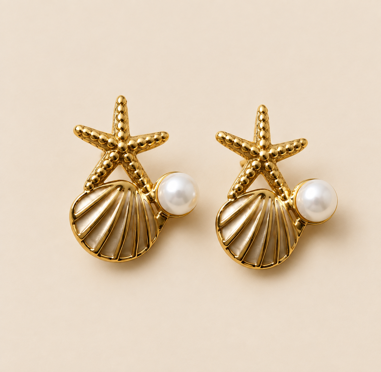 Aretes Estrella Marina — blanco-dorado